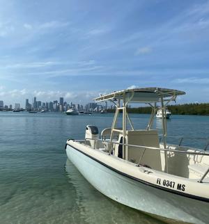 year make model boat rental in North Miami
